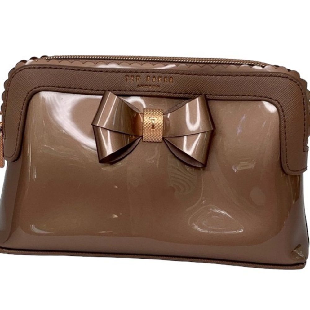 TED BAKER patent material with bow detail makeup case